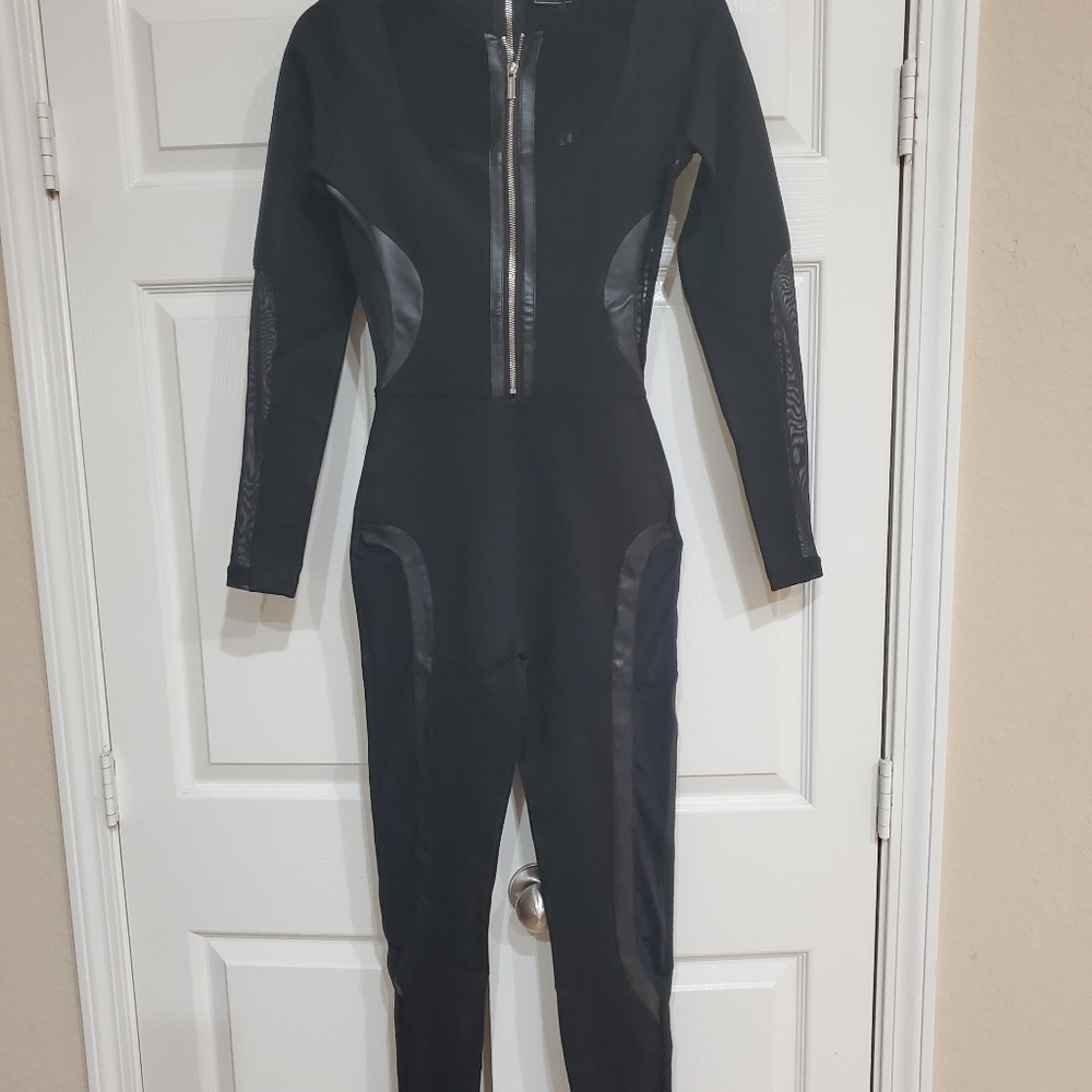 Black Mesh detail jump suit. Maniere de voir EU S8